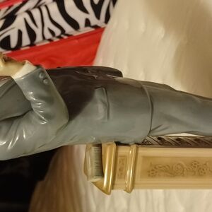 Elegant Gray Figurine on Ornate Base